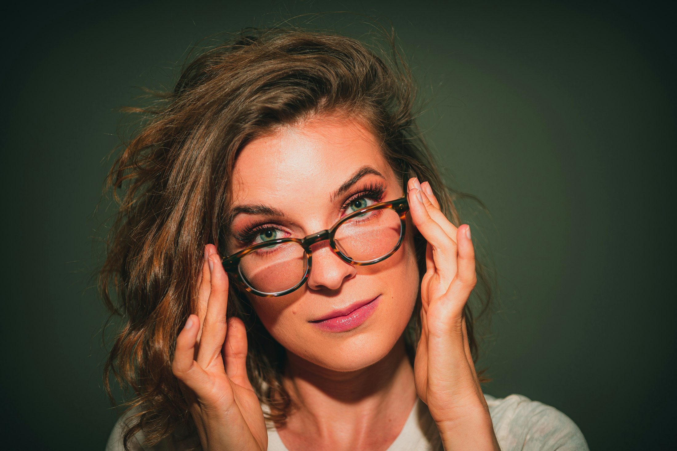 Woman wearing classic black optical frames